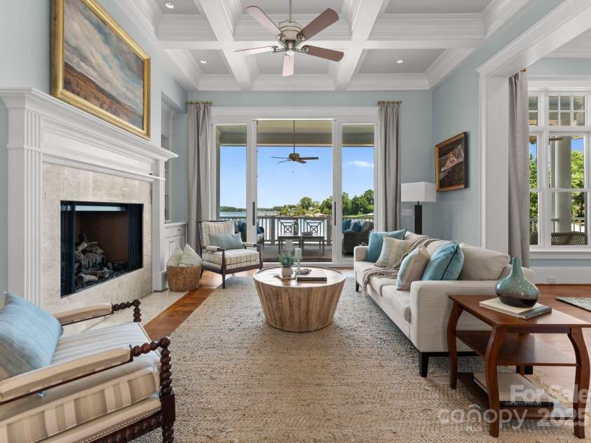 16921 Jetton Road, Cornelius, NC 28031.  MLS# CAR4191237, YatesRealty ID 302. Living Room with access to covered porch