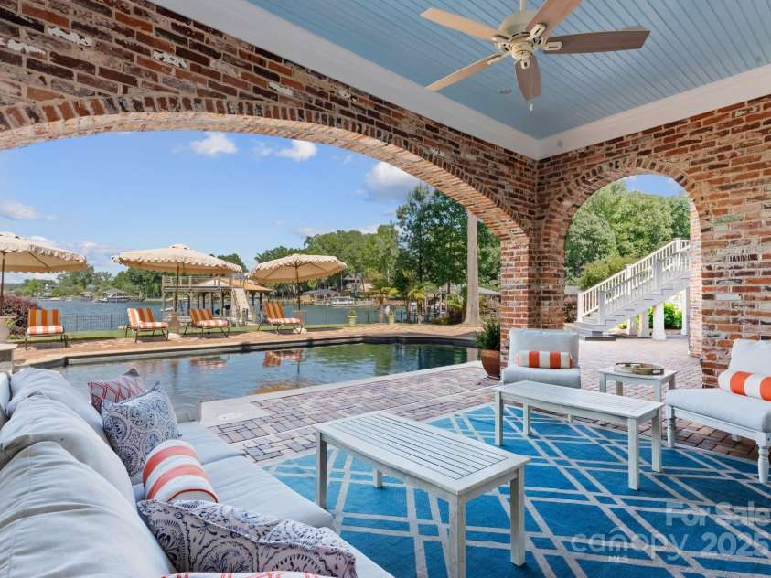 16921 Jetton Road, Cornelius, NC 28031.  MLS# CAR4191237, YatesRealty ID 302. Lower level covered porch