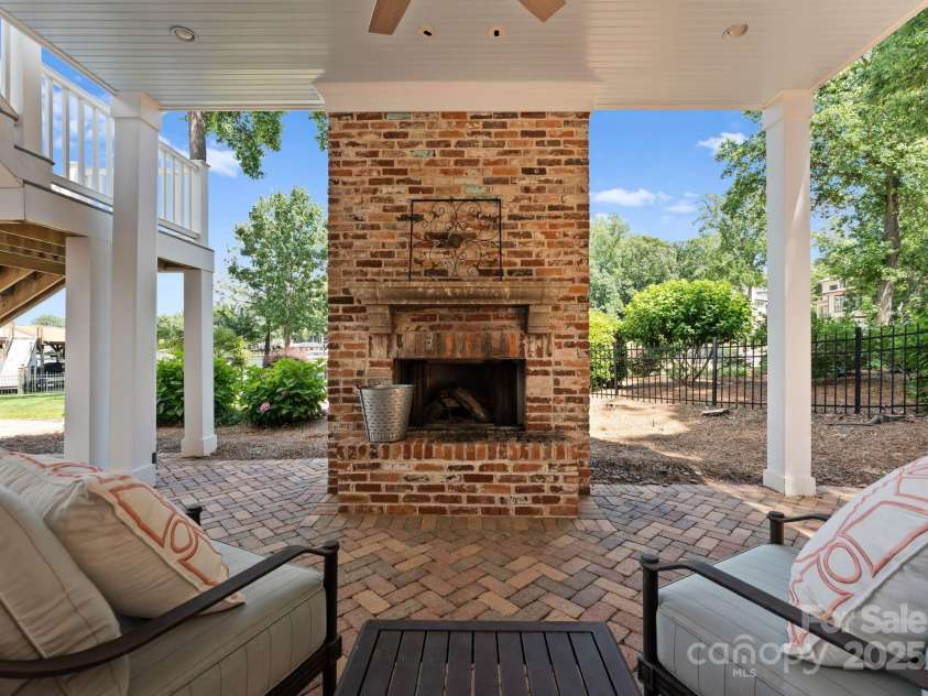 16921 Jetton Road, Cornelius, NC 28031.  MLS# CAR4191237, YatesRealty ID 302. Outdoor fireplace on lower level