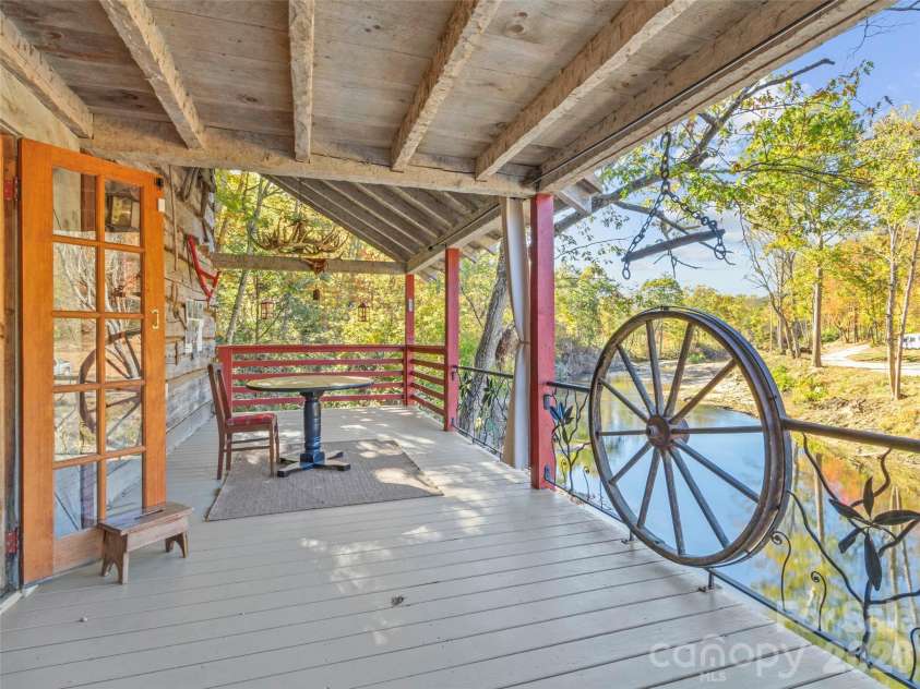 996 HALLS CHAPEL Road, Burnsville, NC 28714.  MLS# CAR4314014, YatesRealty ID 302. Custom wrought iron railing.