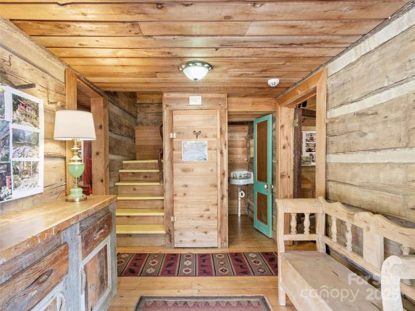 996 Halls Chapel Road, Burnsville, NC 28714.  MLS# CAR4314014, YatesRealty ID 302. Foyer from porch