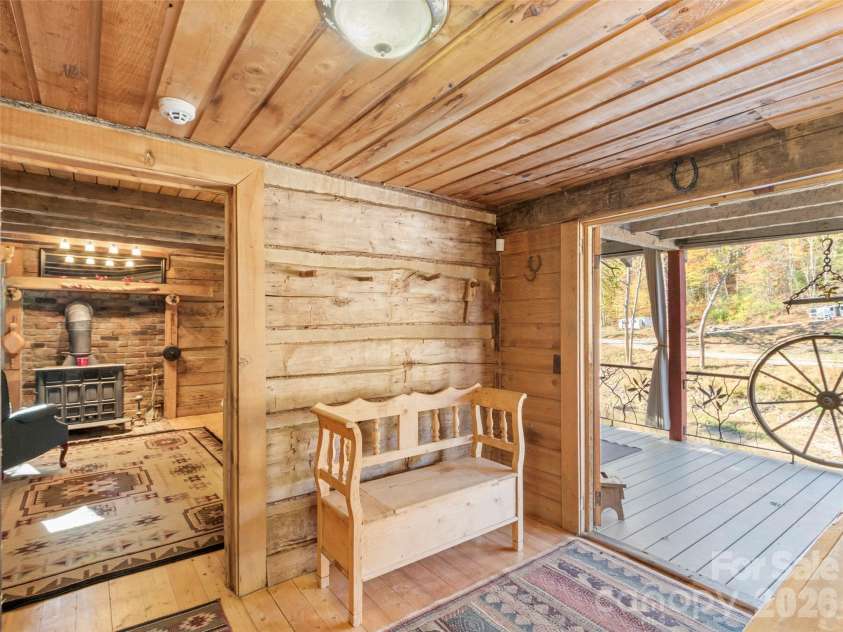 996 HALLS CHAPEL Road, Burnsville, NC 28714.  MLS# CAR4314014, YatesRealty ID 302. Foyer to porch