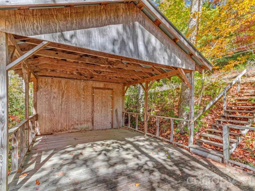996 HALLS CHAPEL Road, Burnsville, NC 28714.  MLS# CAR4314014, YatesRealty ID 302. Shed down stream