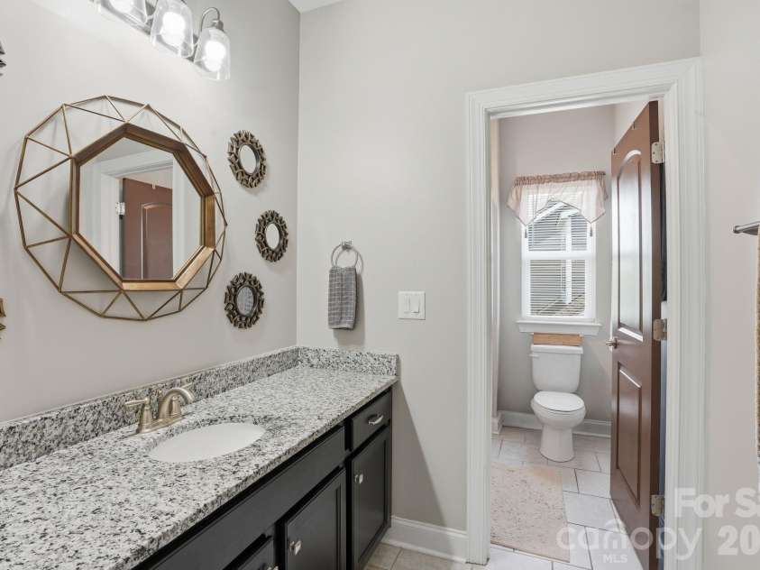 9833 Andres Duany Drive, Huntersville, NC 28078.  MLS# CAR4390023, YatesRealty ID 30207. Secondary Bathroom