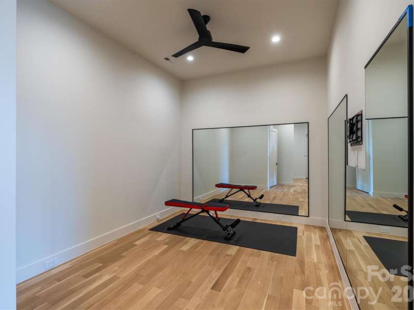 463 Summit Trail, Nebo, NC 28761.  MLS# CAR4350199, YatesRealty ID 3021. Exercise room in lower level