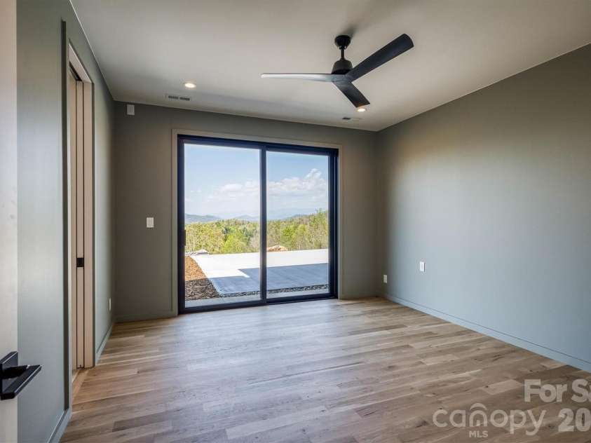 463 Summit Trail, Nebo, NC 28761.  MLS# CAR4350199, YatesRealty ID 3021. Lower level bedroom #2
