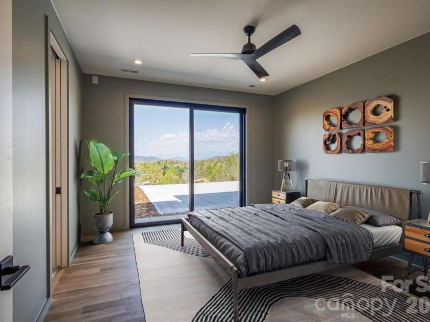 463 Summit Trail, Nebo, NC 28761.  MLS# CAR4350199, YatesRealty ID 3021. Lower level bedroom with virtual staging