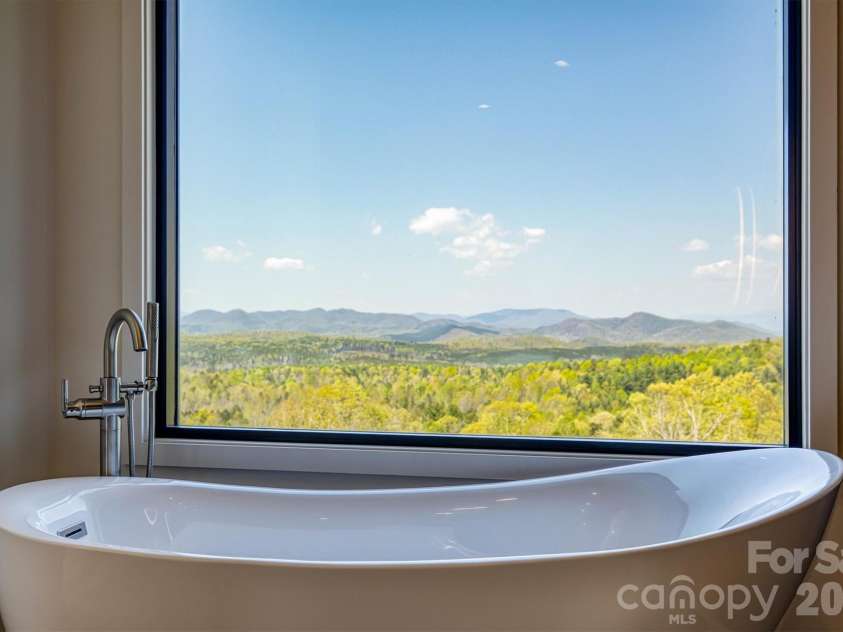 463 Summit Trail, Nebo, NC 28761.  MLS# CAR4350199, YatesRealty ID 3021. Soaking tub with a view