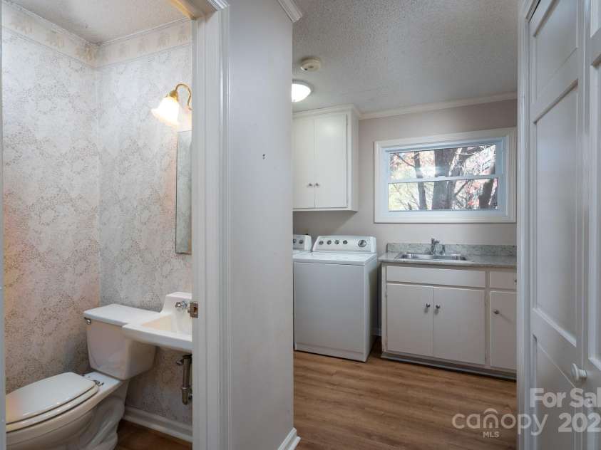 758 Williamsburg Drive, Concord, NC 28025.  MLS# CAR4248248, YatesRealty ID 3021. Laundry/Half Bath Main Floor