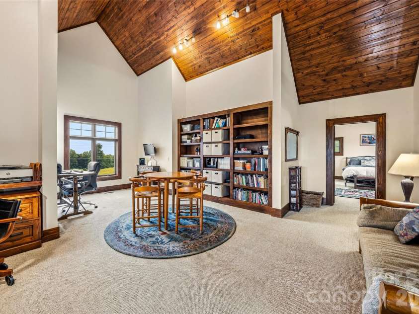4862 Pinnacle Mountain Road, Zirconia, NC 28790.  MLS# CAR4383649, YatesRealty ID 30211. Upper level loft/library