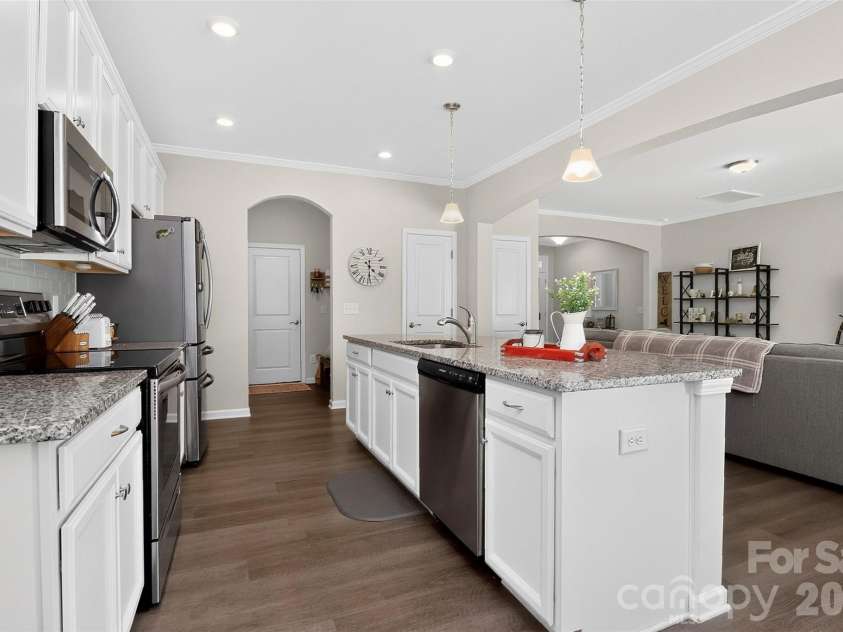 773 River Park Road, Belmont, NC 28012.  MLS# CAR4391220, YatesRealty ID 30213. Architectural Details Make the Difference. Graceful arched openings create elegant sightlines throughout the main level, adding warmth, character, and timeless style to the home's open-concept design.