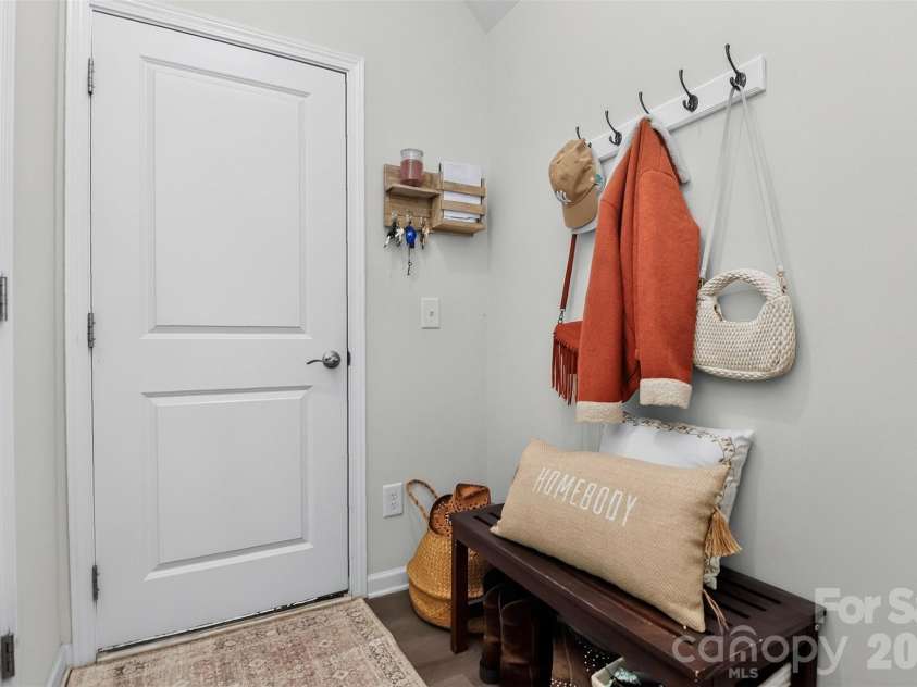 773 River Park Road, Belmont, NC 28012.  MLS# CAR4391220, YatesRealty ID 30213. Designed for Everyday Living. Just inside the garage, this convenient drop zone provides the perfect place to organize coats, shoes, backpacks, and keys—helping keep the rest of your home tidy, organized, and ready for w