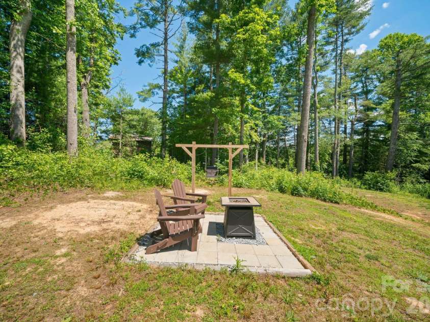 151 Field Sparrow Lane, Hendersonville, NC 28792.  MLS# CAR4388296, YatesRealty ID 30216. Fire Pit Area