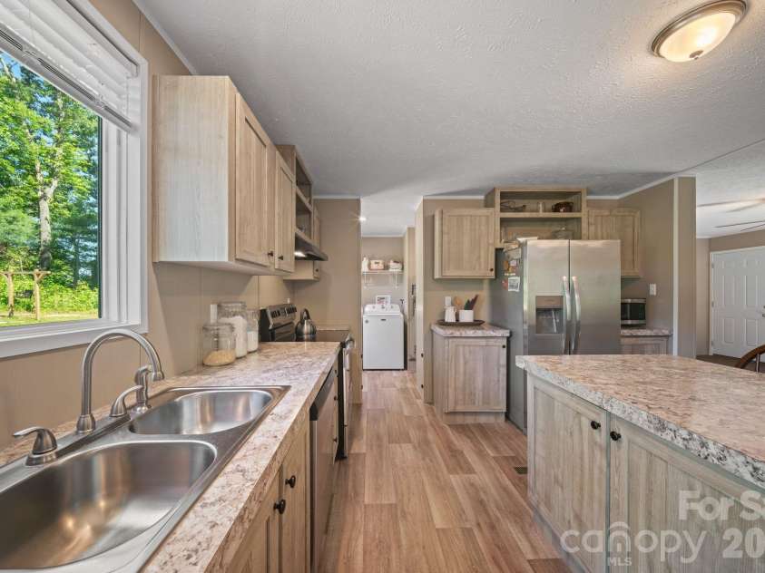 151 Field Sparrow Lane, Hendersonville, NC 28792.  MLS# CAR4388296, YatesRealty ID 30216. Kitchen