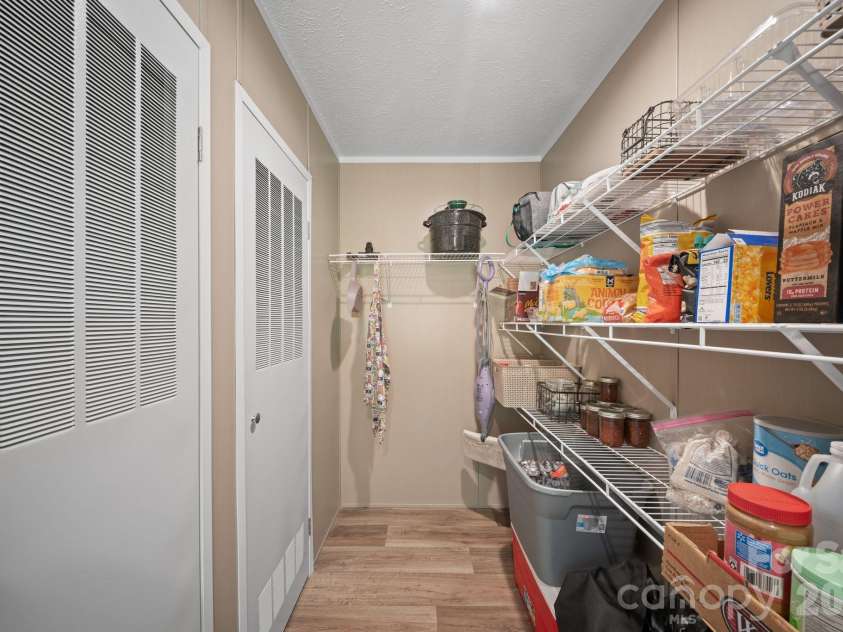 151 Field Sparrow Lane, Hendersonville, NC 28792.  MLS# CAR4388296, YatesRealty ID 30216. Pantry + Utility Closets