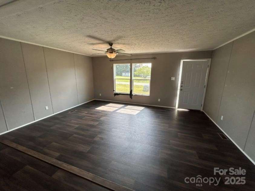 1849 Weston Drive, Vale, NC 28168.  MLS# CAR4289232, YatesRealty ID 30218. Living Room
