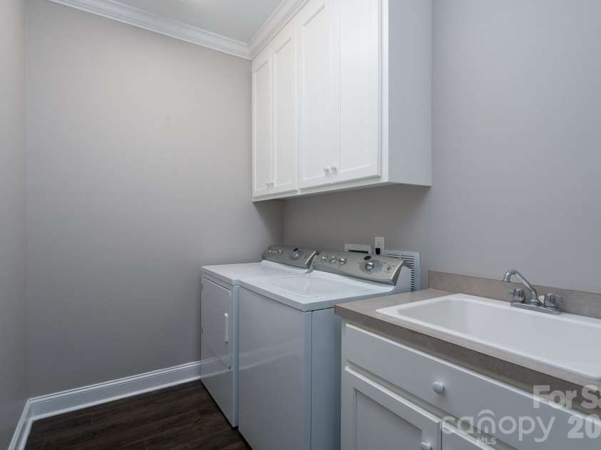 338 Plantation Way, Mount Gilead, NC 27306.  MLS# CAR4335615, YatesRealty ID 3022. Basement Laundry Room