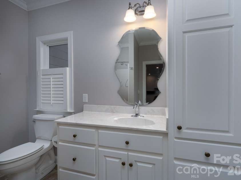 338 Plantation Way, Mount Gilead, NC 27306.  MLS# CAR4335615, YatesRealty ID 3022. Main Level Hall Bathroom