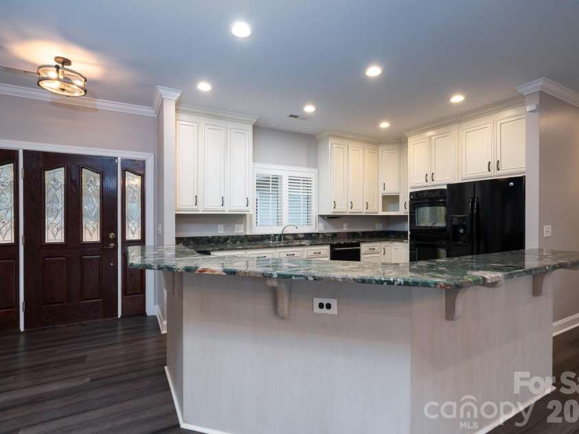 338 Plantation Way, Mount Gilead, NC 27306.  MLS# CAR4335615, YatesRealty ID 3022. Main Level Kitchen