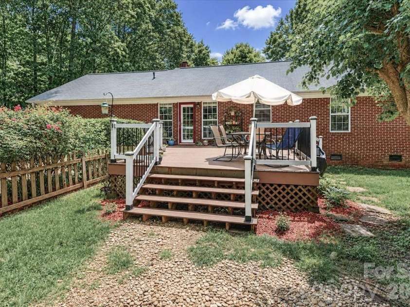6803 Lowesville Lane, Stanley, NC 28164.  MLS# CAR4385358, YatesRealty ID 30226. Back of home