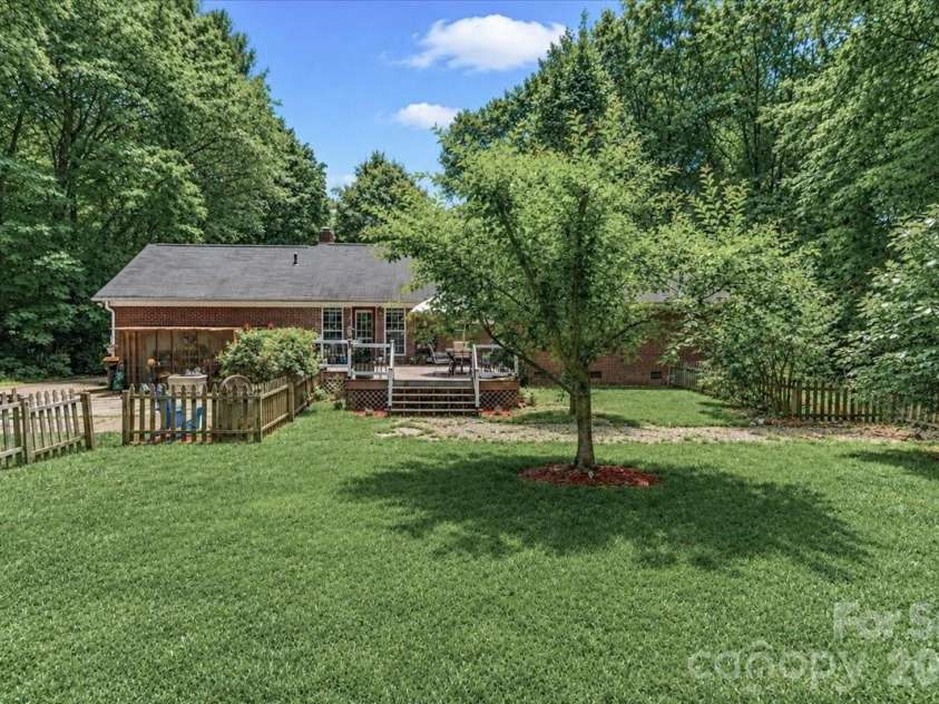6803 Lowesville Lane, Stanley, NC 28164.  MLS# CAR4385358, YatesRealty ID 30226. Backyard