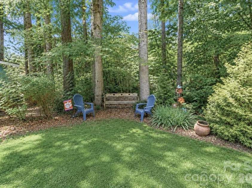 6803 Lowesville Lane, Stanley, NC 28164.  MLS# CAR4385358, YatesRealty ID 30226. Backyard