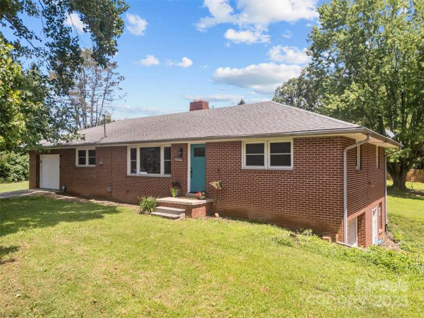 50 Baldwin Road, Arden, NC 28704.  MLS# CAR4288417, YatesRealty ID 30233. Front of house highlighting seperate entrances