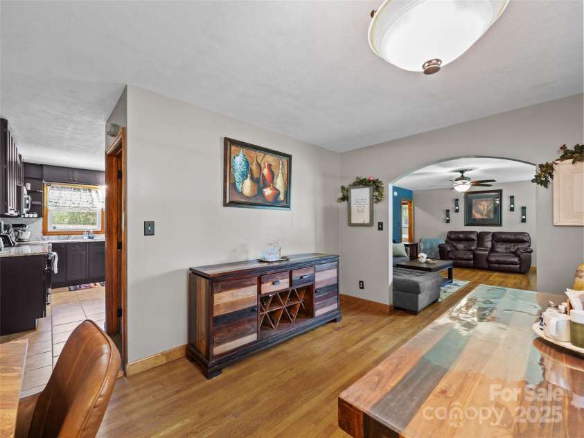 50 Baldwin Road, Arden, NC 28704.  MLS# CAR4288417, YatesRealty ID 30233. Perfect flow! Dining Room into Living Room and Kitchen