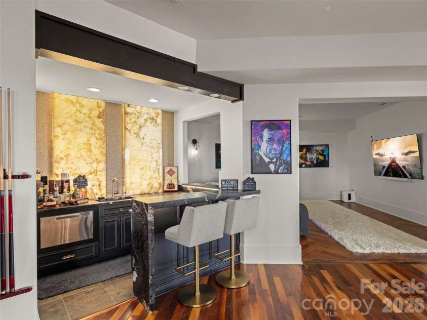 47 Ridge Pine Trail, Arden, NC 28704.  MLS# CAR4370746, YatesRealty ID 30234. Entertainment level looking towards the bar
