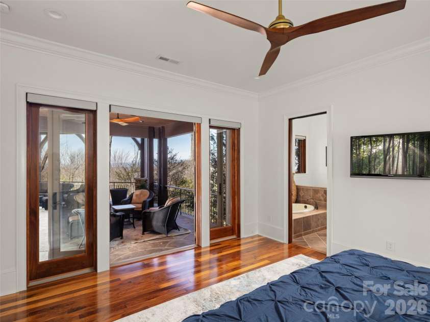 47 Ridge Pine Trail, Arden, NC 28704.  MLS# CAR4370746, YatesRealty ID 30234. Guest suite with door to deck