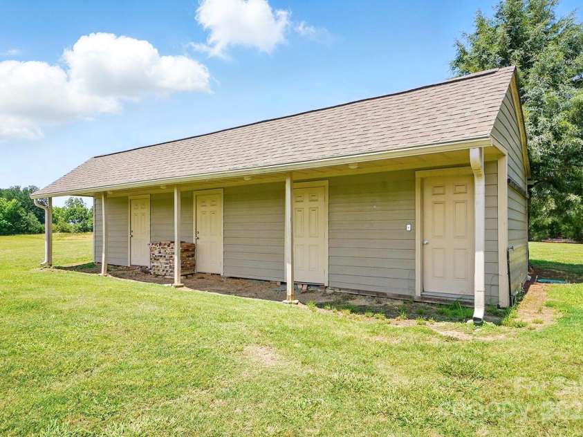 7204 NC 218 Highway, Marshville, NC 28103.  MLS# CAR4273852, YatesRealty ID 30238. 4 Door Barn