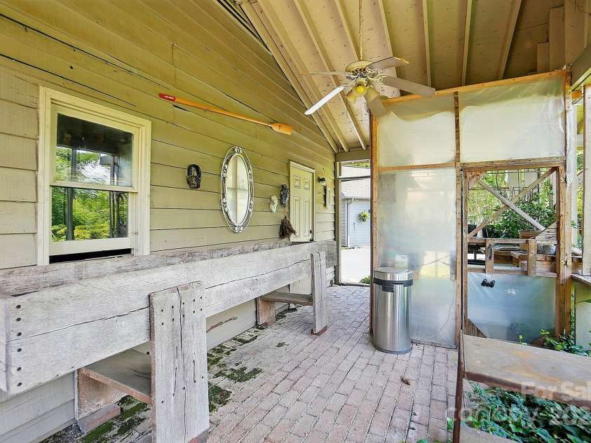 7204 NC 218 Highway, Marshville, NC 28103.  MLS# CAR4273852, YatesRealty ID 30238. Covered Green House Behind the Garage