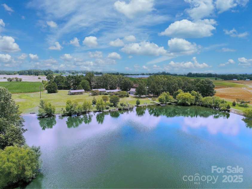 7204 NC 218 Highway, Marshville, NC 28103.  MLS# CAR4273852, YatesRealty ID 30238. Lake View of the Manor Property