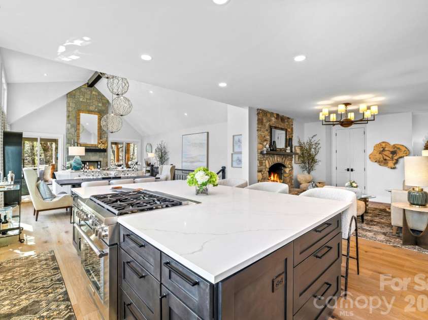 95 Cardinal Trace, Lake Toxaway, NC 28747.  MLS# CAR4431327, YatesRealty ID 30238. Chef's Kitchen with views into the Great and Hearth Rms