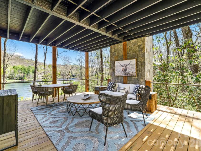 95 Cardinal Trace, Lake Toxaway, NC 28747.  MLS# CAR4431327, YatesRealty ID 30238. Lower Level covered Porch