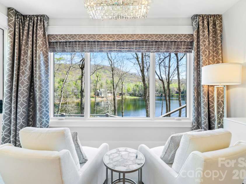 95 Cardinal Trace, Lake Toxaway, NC 28747.  MLS# CAR4431327, YatesRealty ID 30238. Primary Suite Sitting Area with calming water views