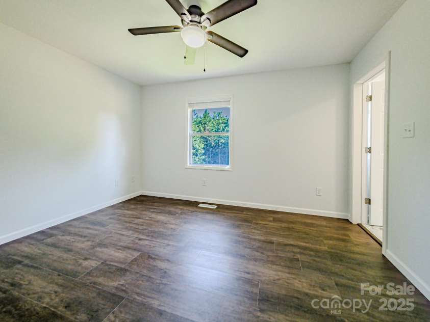 204 Caldwell Street, Forest City, NC 28043.  MLS# CAR4283485, YatesRealty ID 30239. Primary Bedroom with Ensuite Bathroom