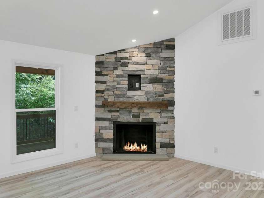 147 Wood Road, Brevard, NC 28712.  MLS# CAR4285999, YatesRealty ID 30240. Gas Fireplace!