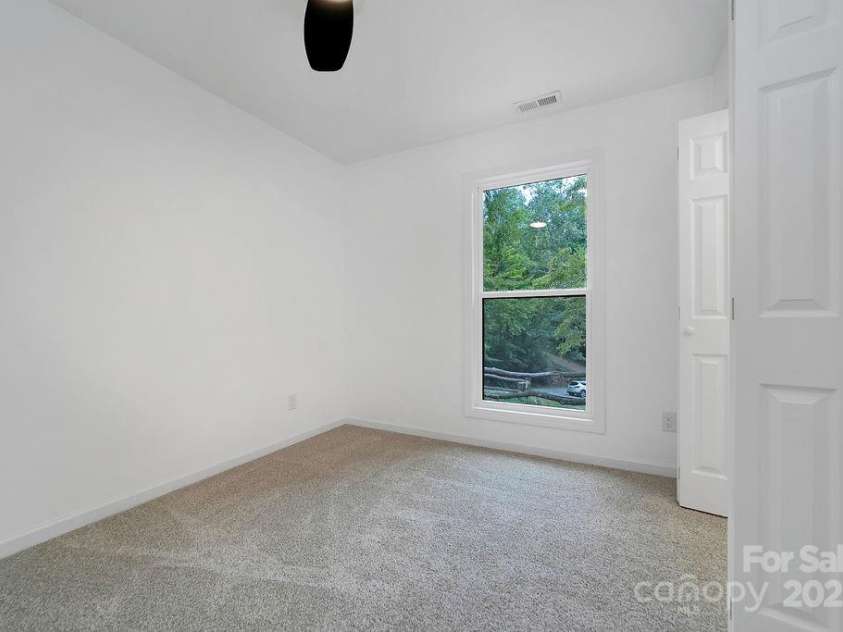 147 Wood Road, Brevard, NC 28712.  MLS# CAR4285999, YatesRealty ID 30240. Guest Room