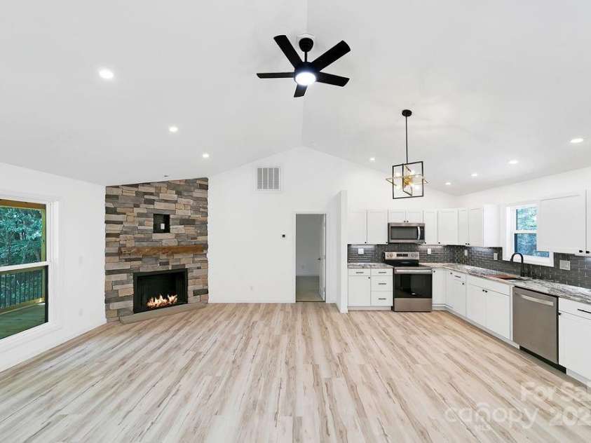 147 Wood Road, Brevard, NC 28712.  MLS# CAR4285999, YatesRealty ID 30240. Living Area and Kitchen