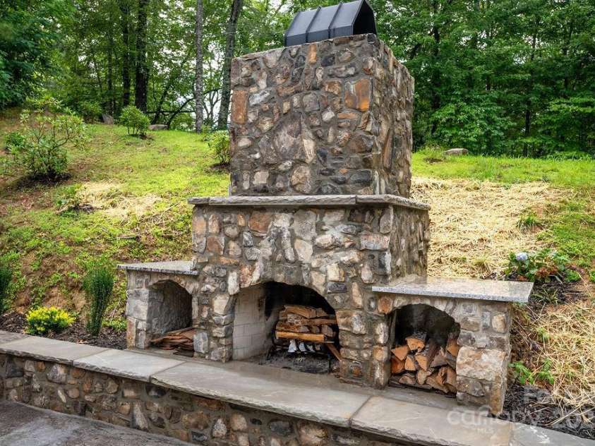 147 Wood Road, Brevard, NC 28712.  MLS# CAR4285999, YatesRealty ID 30240. Massive Fireplace!
