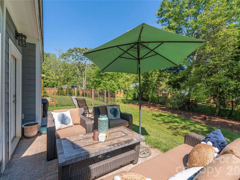 28 Reagan Run Court, Arden, NC 28704.  MLS# CAR4377989, YatesRealty ID 30240. Back patio