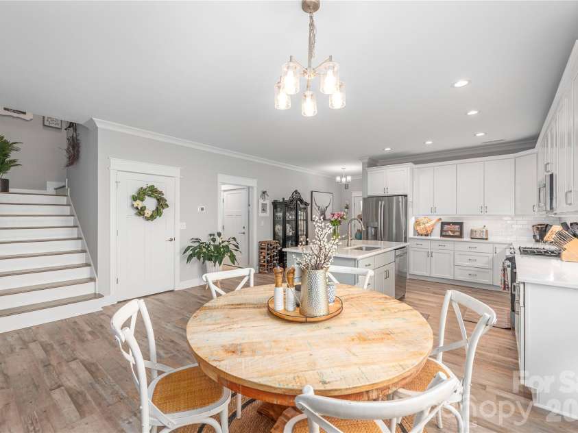28 Reagan Run Court, Arden, NC 28704.  MLS# CAR4377989, YatesRealty ID 30240. Dining area open to kitchen