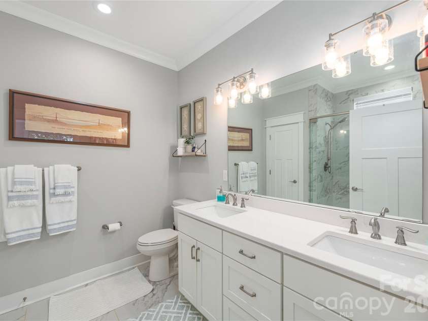 28 Reagan Run Court, Arden, NC 28704.  MLS# CAR4377989, YatesRealty ID 30240. Double vanity in master bath