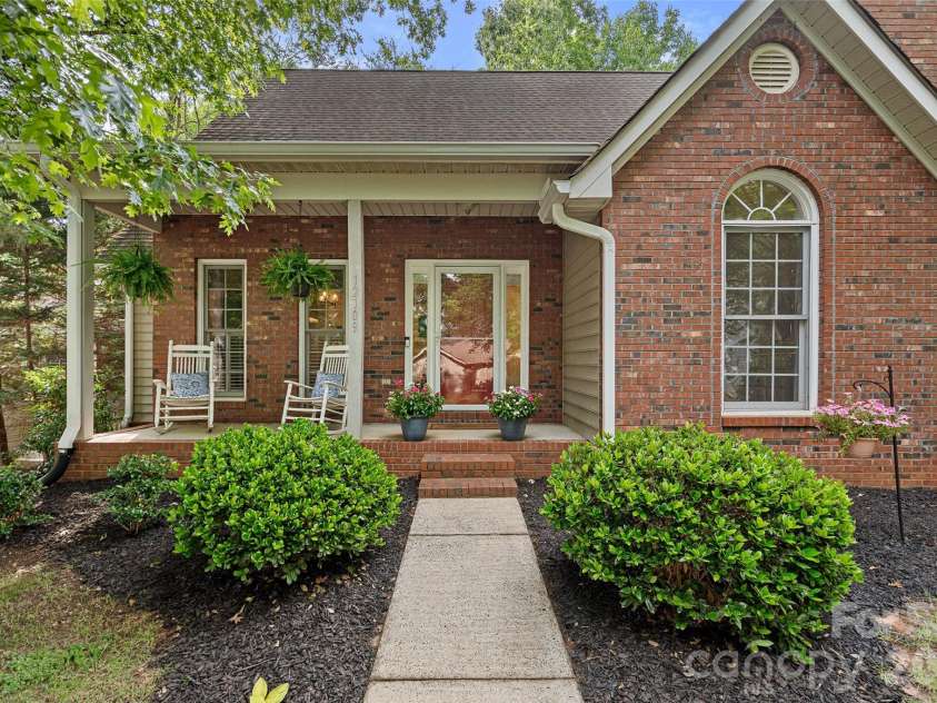12109 Baywoods Drive, Tega Cay, SC 29708.  MLS# CAR4389480, YatesRealty ID 30248. Inviting front porch