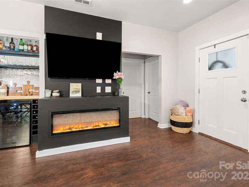 2717 Arnold Drive, Charlotte, NC 28205.  MLS# CAR4279060, YatesRealty ID 30249. Built-in bar easily converts into a hall closet.