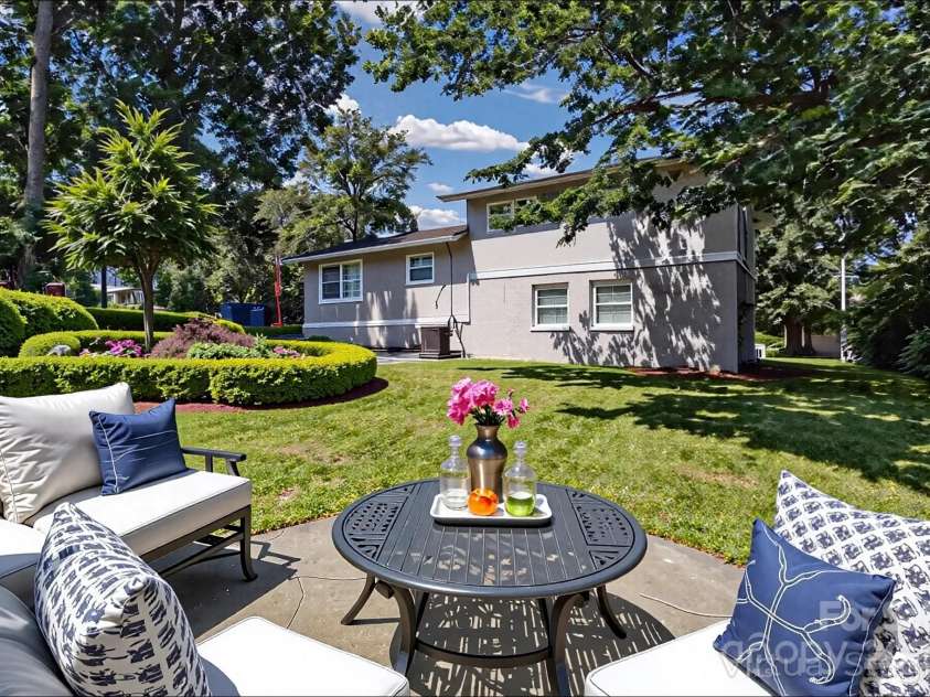4635 Thornwood Road, Charlotte, NC 28213.  MLS# CAR4276510, YatesRealty ID 30250. Rear shot of home & expansive backyard (virtually staged).