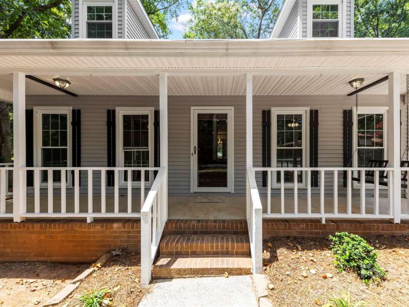 114 Carrigan Drive, Belmont, NC 28012.  MLS# CAR4285534, YatesRealty ID 30254. Front porch with swing