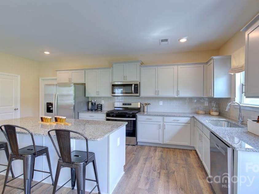 145 Bovine Branch Road, Fletcher, NC 28732.  MLS# CAR4286892, YatesRealty ID 30258. Photos are representative