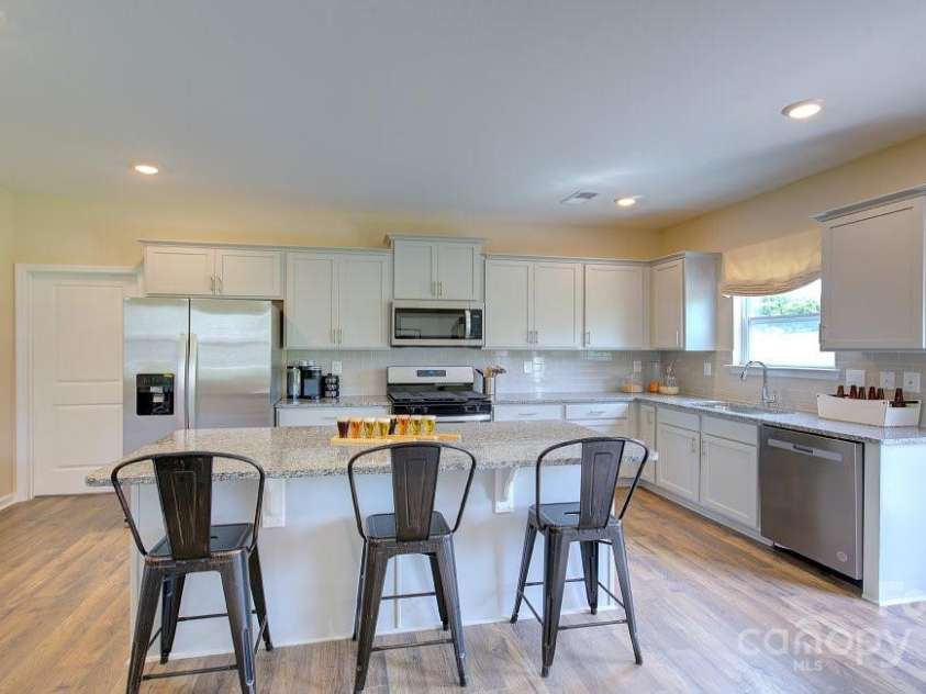 145 Bovine Branch Road, Fletcher, NC 28732.  MLS# CAR4286892, YatesRealty ID 30258. Photos are representative
